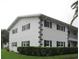 Well-maintained building exterior with landscaping at 305 47Th Avenue W Dr # 143, Bradenton, FL 34207