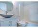 Updated bathroom with a new vanity, vessel sink, and bathtub at 3259 Beneva Rd # 102, Sarasota, FL 34232