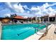 Enjoy the resort-style community pool with comfortable lounge areas at 3259 Beneva Rd # 102, Sarasota, FL 34232