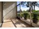 Spacious screened patio with tile flooring and lush landscaping views at 3259 Beneva Rd # 102, Sarasota, FL 34232