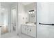 Modern bathroom with double vanity and marble tile at 3782 Horace Ave, North Port, FL 34286