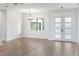 Bright dining room with hardwood floors and chandelier at 3782 Horace Ave, North Port, FL 34286