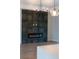 Modern electric fireplace with gray tile surround at 3782 Horace Ave, North Port, FL 34286