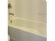 Clean bathroom with a bathtub and neutral tile at 4326 Silo Port Ct, Lakewood Ranch, FL 34211