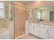Bathroom features a large shower, soaking tub, and modern vanity at 4326 Silo Port Ct, Lakewood Ranch, FL 34211