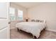 Comfortable bedroom with a plush bed and neutral color scheme at 4326 Silo Port Ct, Lakewood Ranch, FL 34211