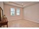Bright bedroom with tile floors and plantation shutters at 4326 Silo Port Ct, Lakewood Ranch, FL 34211