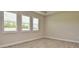 Spacious bedroom with tile floors and plantation shutters at 4326 Silo Port Ct, Lakewood Ranch, FL 34211