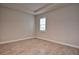 Empty bedroom with tile floors and window with shutters at 4326 Silo Port Ct, Lakewood Ranch, FL 34211