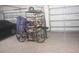 Garage with car, bicycle, and shelving at 4326 Silo Port Ct, Lakewood Ranch, FL 34211