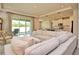 Spacious living room with large sectional sofa and access to backyard at 4326 Silo Port Ct, Lakewood Ranch, FL 34211