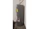 Grey water heater in a corner of a carpeted room at 4326 Silo Port Ct, Lakewood Ranch, FL 34211
