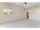 Spacious bedroom with tile flooring and access to bathroom at 4581 E Dover Street Cir, Bradenton, FL 34203