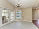Spacious dining area with pool view and access to patio at 4581 E Dover Street Cir, Bradenton, FL 34203