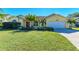 Single-story house with a large yard at 4581 E Dover Street Cir, Bradenton, FL 34203