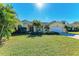 Single-story house with a well maintained lawn at 4581 E Dover Street Cir, Bradenton, FL 34203