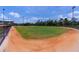 Baseball infield with well-maintained grass and dirt at 4892 Hillman Ter, North Port, FL 34288