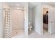 Bathroom with shower, toilet, and walk-in closet at 4892 Hillman Ter, North Port, FL 34288