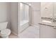 Bathroom with bathtub, shower, and granite vanity at 4892 Hillman Ter, North Port, FL 34288