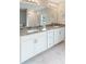 Double vanity bathroom with granite countertop at 4892 Hillman Ter, North Port, FL 34288