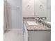 Double vanity bathroom with granite countertop at 4892 Hillman Ter, North Port, FL 34288