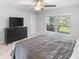 Bright bedroom with dresser and window overlooking backyard at 4892 Hillman Ter, North Port, FL 34288