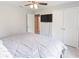 Bedroom with king-size bed and access to bathroom at 4892 Hillman Ter, North Port, FL 34288