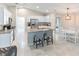 Spacious kitchen featuring granite countertops and an island at 4892 Hillman Ter, North Port, FL 34288