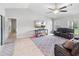 Open living room with recessed lighting and tile floors at 4892 Hillman Ter, North Port, FL 34288