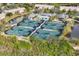 Aerial view of community tennis courts and pool at 5179 Flicker Field Cir, Sarasota, FL 34231