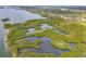 Aerial view of mangrove preserve with walking path and waterways at 5179 Flicker Field Cir, Sarasota, FL 34231