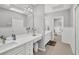 Elegant bathroom with double vanity, soaking tub, and walk-in shower at 5179 Flicker Field Cir, Sarasota, FL 34231