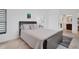 Guest bedroom with a comfortable bed and ensuite bathroom access at 5179 Flicker Field Cir, Sarasota, FL 34231