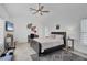 Spacious bedroom with a king-size bed and a built-in desk at 5179 Flicker Field Cir, Sarasota, FL 34231