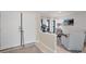 Bright and airy entryway leading into a living room at 5179 Flicker Field Cir, Sarasota, FL 34231