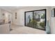 Hallway with view into backyard pool and patio at 5179 Flicker Field Cir, Sarasota, FL 34231