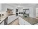 Spacious kitchen with granite countertops and stainless steel appliances at 5179 Flicker Field Cir, Sarasota, FL 34231