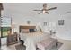 Bright and airy main bedroom with king bed and ensuite bathroom at 5179 Flicker Field Cir, Sarasota, FL 34231