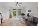 Home office with built-in desk and access to backyard at 5179 Flicker Field Cir, Sarasota, FL 34231