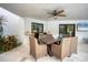 Outdoor patio with a dining table and seating for six at 5179 Flicker Field Cir, Sarasota, FL 34231