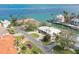 Single-story home with circular driveway and canal views in a quiet waterfront community at 548 Ketch Ln, Longboat Key, FL 34228