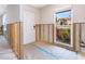 Renovation in progress, showing entryway with new door and exposed framing at 548 Ketch Ln, Longboat Key, FL 34228