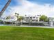 Waterfront home with private dock and lush landscaping at 548 Ketch Ln, Longboat Key, FL 34228