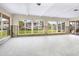 Spacious living area under renovation with large windows and waterfront view at 548 Ketch Ln, Longboat Key, FL 34228