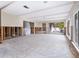 Living Room under renovation with water damage and exposed framing at 548 Ketch Ln, Longboat Key, FL 34228