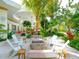 Relaxing patio with fire pit and comfortable seating at 548 Ketch Ln, Longboat Key, FL 34228