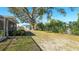 Large backyard with mature oak tree and shed at 5706 10Th Avenue Dr W, Bradenton, FL 34209