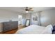 Bright bedroom with a king-size bed and en-suite bathroom at 5706 10Th Avenue Dr W, Bradenton, FL 34209