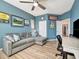 Multi-purpose bonus room, sectional sofa and home office space at 5904 Wake Forest Run # 102, Bradenton, FL 34211