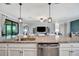 Kitchen island with granite countertop, stainless steel sink and dishwasher at 5904 Wake Forest Run # 102, Bradenton, FL 34211